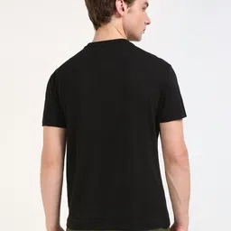 Tommy Hilfiger Men Solid Round Neck Cotton T-shirt image 3
