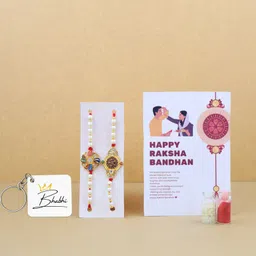 international gift Thread Raksha Bandhan Gift with Polyresin Ganesha Idol, 2 Rakhi, Keyring (IG20) Assorted Showpiece Set image 2