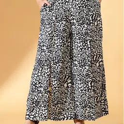 CURVE BY KASSUALLY Women Black & White Animal Printed Flared Parallel Trousers-image-55
