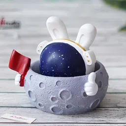 eCraftIndia Grey Figurine Moon Shaking Head With Red Flag Showpiece image 2