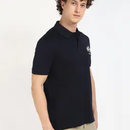 Tommy Hilfiger Men Solid Polo Collar Cotton T-shirt image 4