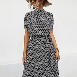 StyleCast x Revolte Black Polka Dot Printed Mock Neck Fit & Flare Dress image 1