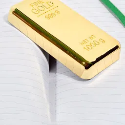 Awestuffs Gold-Toned Bar Paper Weight Stationery image 1