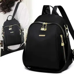 dayalaxmi fashion Small 15 L Backpack Trendy women’s backpack handbag with a sleek solid black look and golden zippers image 2