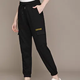 leotude Women Solid Black Track Pants image 2