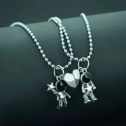 m a enterprises Couples Matching Spaceman Pendant Necklace Magnetic Astronaut Promise pendants. Silver Stainless Steel Pendant Set image 1