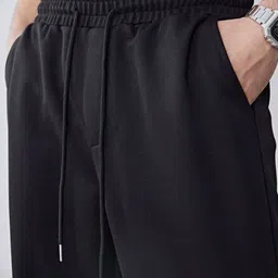 flycollection Men Solid Black Track Pants image 4