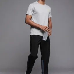 HRX by Hrithik Roshan Men Self Design Rapid-Dry Training Track Pants image 4
