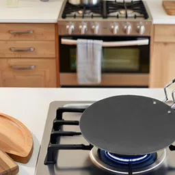 s.k.mandiritemsand kitchenware Pure Iron Tawa With Stainless Steel Handle | Non-Toxic & Healthy Iron Tawa | 1kg Tawa 25.5 cm diameter image 4